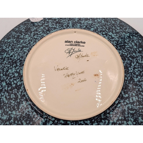 369 - An Alan Clarke Timeslip pattern wall charger signed to reverse - approx. 40cm diameter