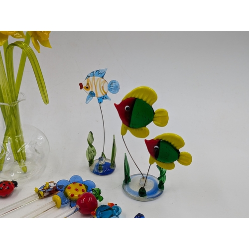 371 - A collection of Murano hand blown glass ornaments and cocktail stirrers