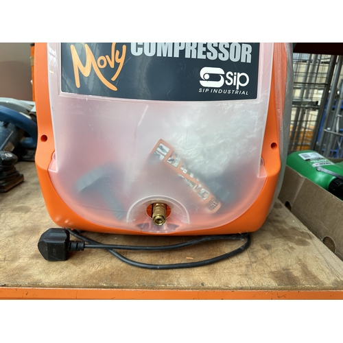 1027 - A boxed Sip Industrial Movy revolution air compressor