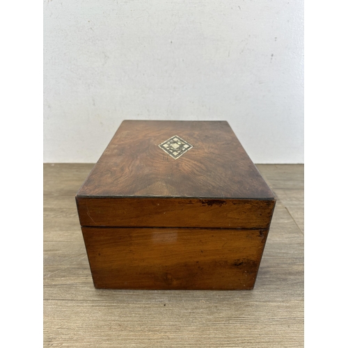 518 - A 19th century walnut and mother of pearl and abalone shell inlaid workbox - approx. 15.5cm high x 3... 