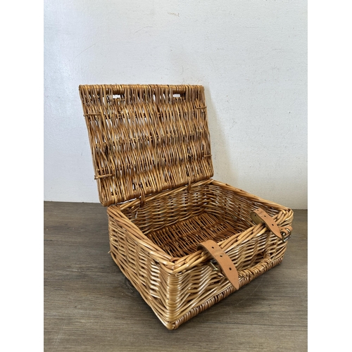 523 - Two Fortnum & Mason wicker baskets - approx. 16cm high x 32cm wide x 24cm deep