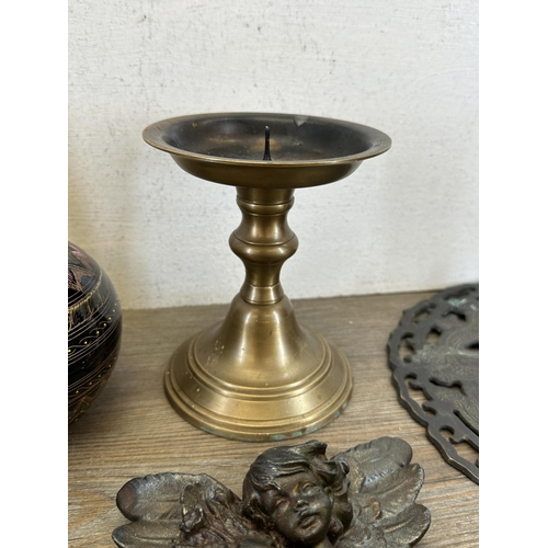 540 - A collection of items to include brass and cast metal candlestick - approx. 39cm high, brown glazed ... 