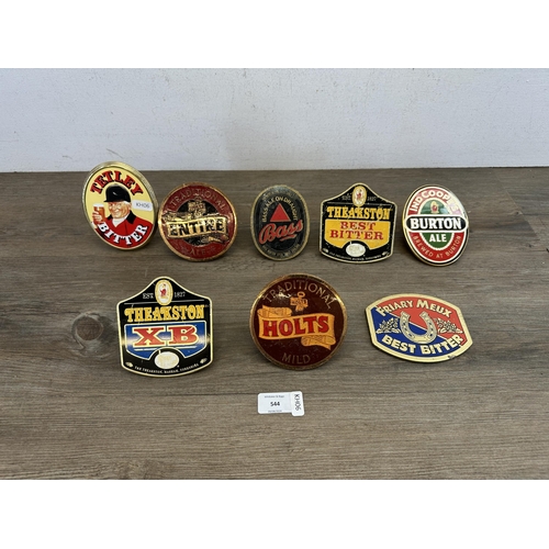 544 - Eight vintage beer pump clip badges to include Tetley Bitter, Burton Ale, Theakston Best Bitter, Hol... 