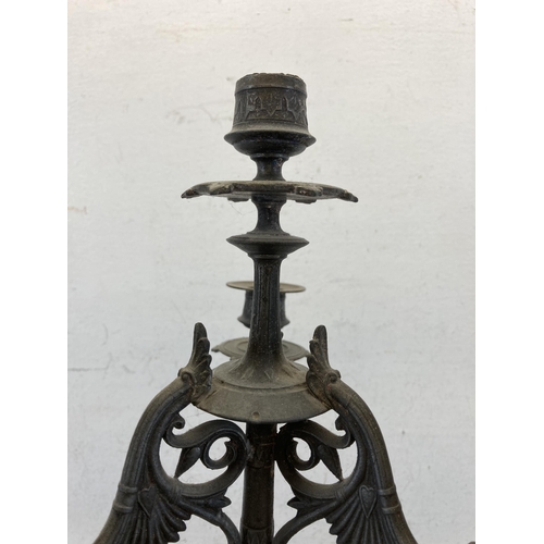 429 - A 19th century cast metal four branch candelabra - approx. 56cm high