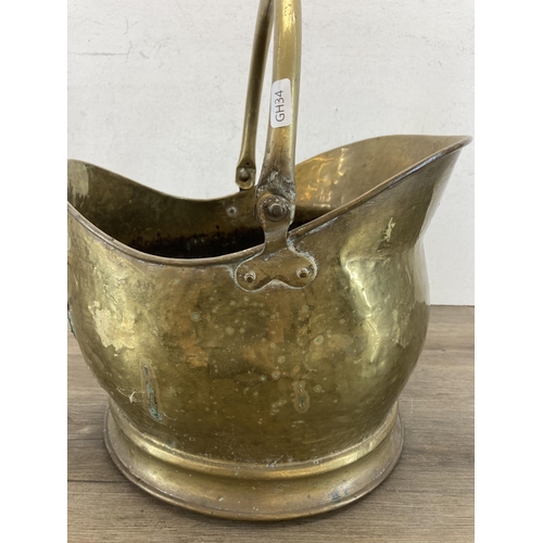 435 - A 19th century brass coal scuttle - approx. 27cm high