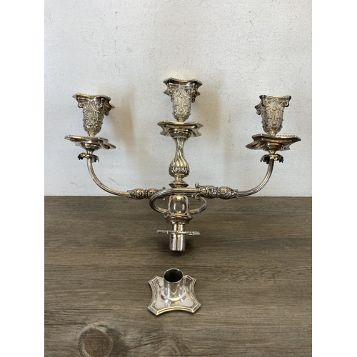 439 - Four pieces of antique metalware, one 19th century silver plated Corinthian candleholder - approx. 3... 