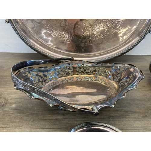 440 - Five pieces of 19th century and later metalware to include large oval silver plated twin handled ser... 