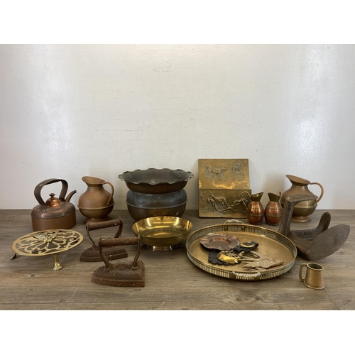 443 - A collection of 19th century and later metalware to include embossed copper jardinière, horse brasse... 