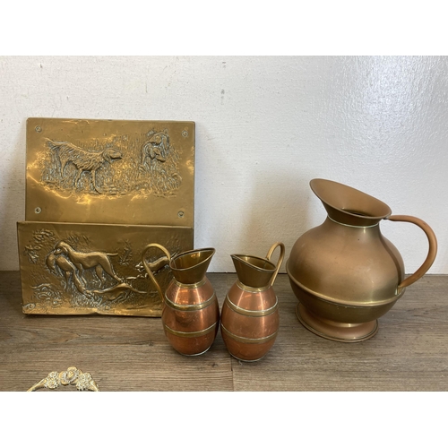 443 - A collection of 19th century and later metalware to include embossed copper jardinière, horse brasse... 