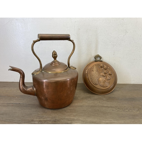 444 - A collection of 19th century and later copper and brass to include copper kettle stamped JJ to base,... 