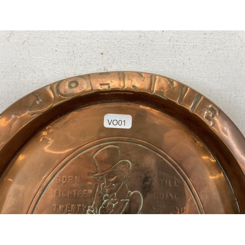 451 - A 1930/40s Johnnie Walker oval copper advertising serving tray - approx. 34.5cm high x 29cm wide