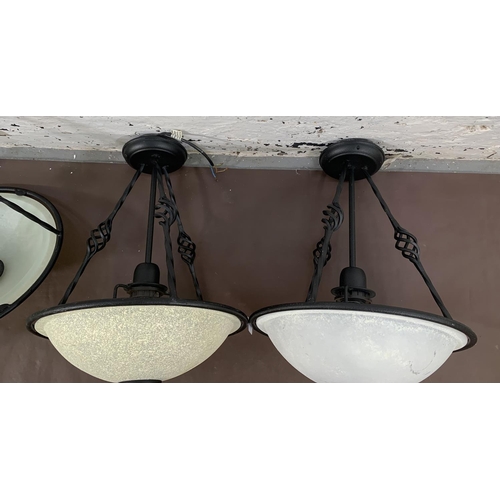 163 - Four modern wrought metal and opaque glass pendant lights