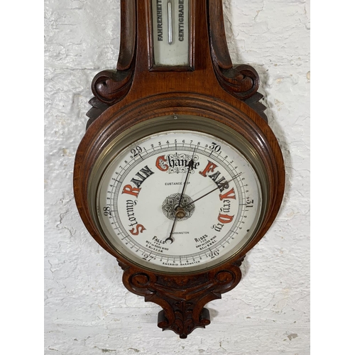 170 - A 19th century Eustance & Co. of Warrington carved oak cased aneroid barometer - approx. 90cm high