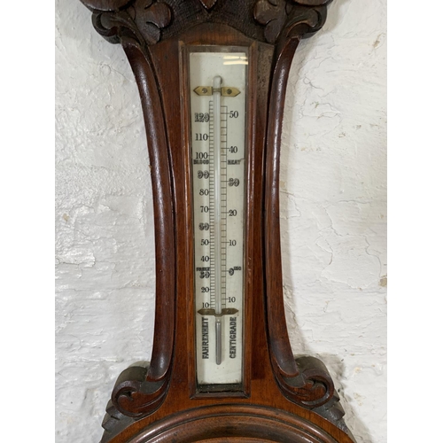 170 - A 19th century Eustance & Co. of Warrington carved oak cased aneroid barometer - approx. 90cm high