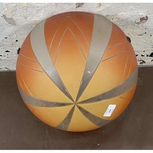 234 - An Art Deco style orange and opaque glass pendant light shade - approx. 35cm diameter