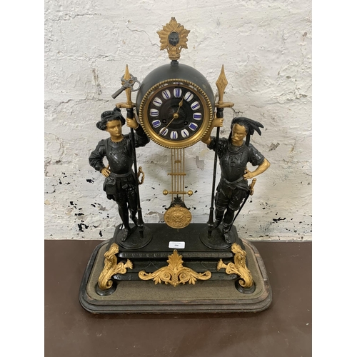 236 - A French Japy Freres gilded spelter figural two train clock with glass dome, pendulum and key on ebo... 