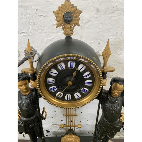 236 - A French Japy Freres gilded spelter figural two train clock with glass dome, pendulum and key on ebo... 