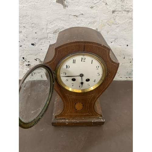 241 - An Edwardian inlaid oak cased balloon shaped chiming mantel clock - approx. 35cm high x 20cm wide x ... 