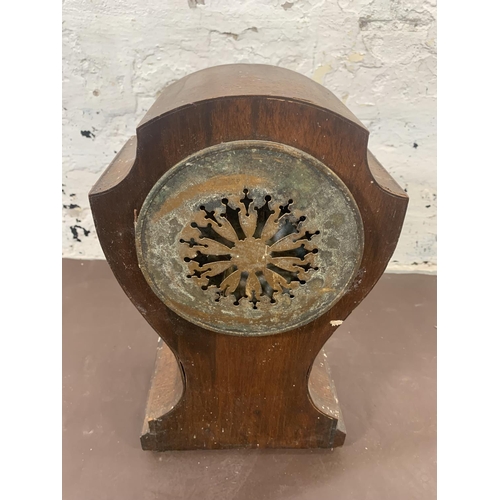 241 - An Edwardian inlaid oak cased balloon shaped chiming mantel clock - approx. 35cm high x 20cm wide x ... 