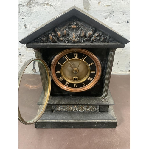 242 - A Kemp & Wilcox of Paris black slate and copper mantel clock with pendulum - approx. 27cm high x 20c... 