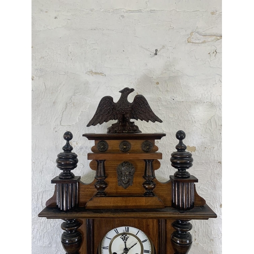 258 - A 19th century German walnut cased regulator wall clock with imperial eagle mount, key and pendulum ... 