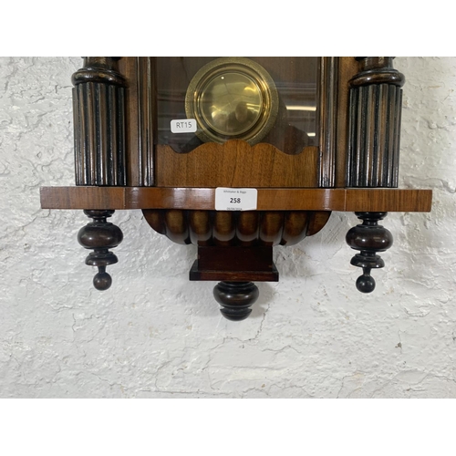 258 - A 19th century German walnut cased regulator wall clock with imperial eagle mount, key and pendulum ... 