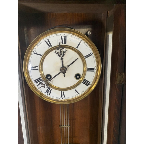 258 - A 19th century German walnut cased regulator wall clock with imperial eagle mount, key and pendulum ... 