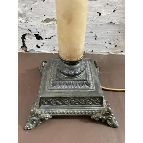 29 - A French Empire style cast metal and marble effect table lamp - approx. 48cm high