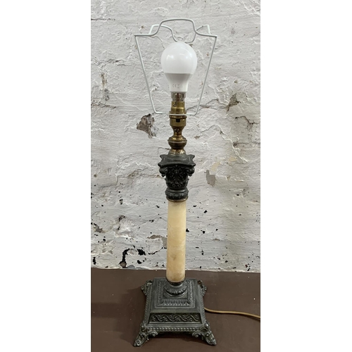 29 - A French Empire style cast metal and marble effect table lamp - approx. 48cm high