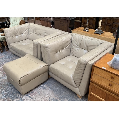 66 - A modern beige leather three piece lounge suite comprising two seater sofa, armchair and footstool