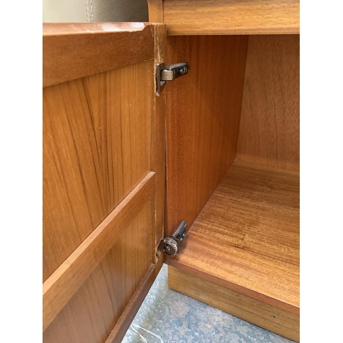 69 - A Nathan Squares teak sideboard - approx. 76cm high x 102cm wide x 44cm deep