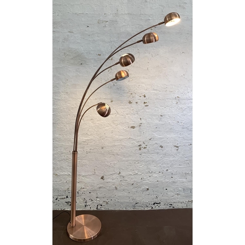 82 - A modern brushed copper effect five light floor lamp - approx. 213cm high