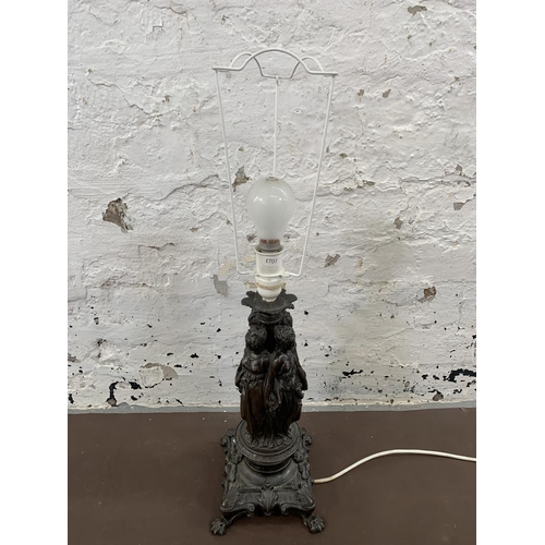 84 - A 19th century style bronzed cast metal figural table lamp - approx. 42cm high