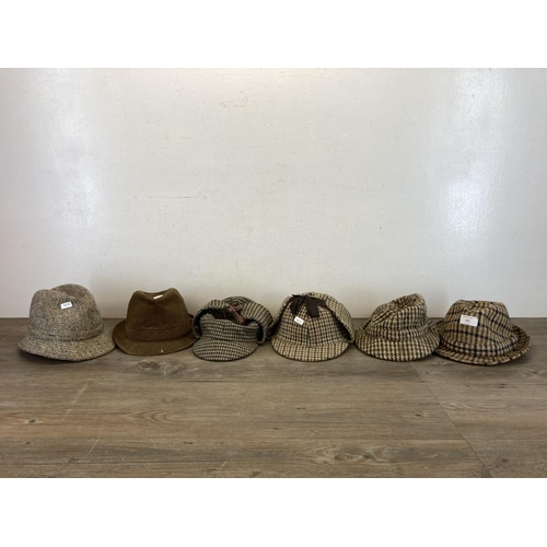 481 - Six vintage men's hats comprising two Dunn & Co. Harris Tweed deer stalkers and four trilbies