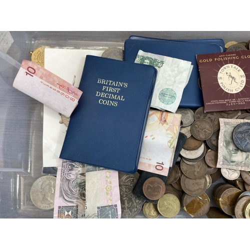 491 - A large collection of world coins, commemorative British coins and banknotes