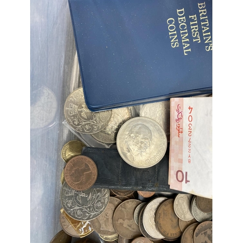 491 - A large collection of world coins, commemorative British coins and banknotes