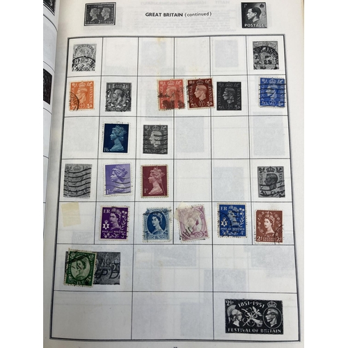 499 - Five stamp albums containing a collection of worldwide stamps