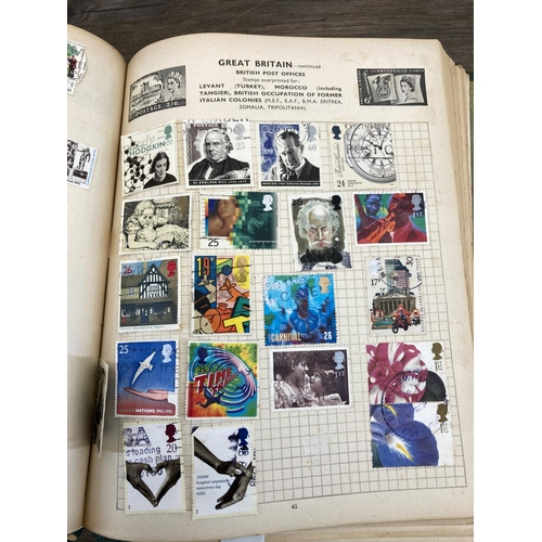 499 - Five stamp albums containing a collection of worldwide stamps