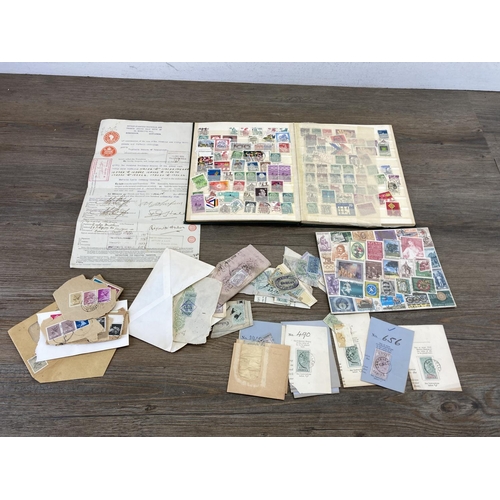 501 - An album containing a collection of worldwide stamps