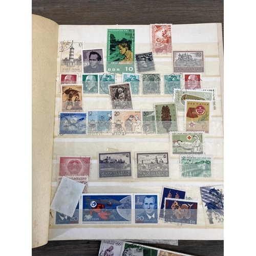 501 - An album containing a collection of worldwide stamps