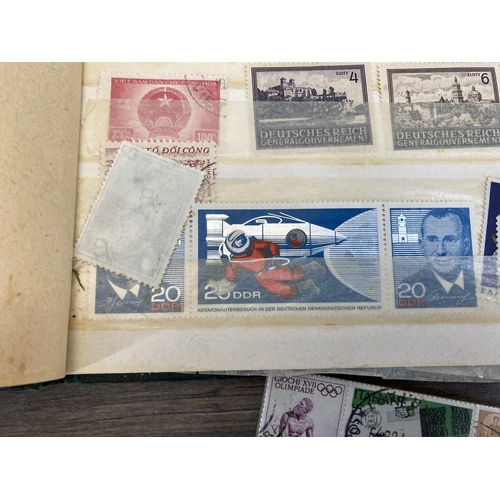 501 - An album containing a collection of worldwide stamps