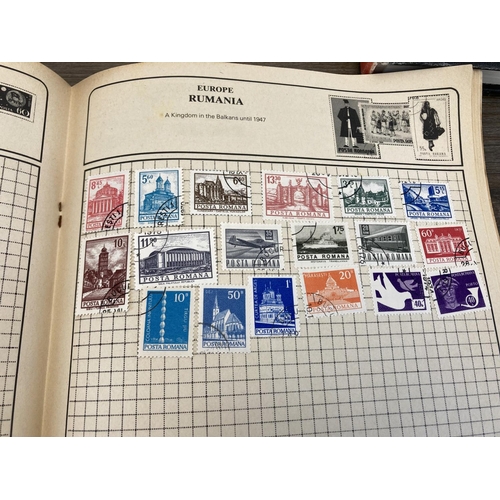 502 - Five stamp albums containing a collection of worldwide stamps