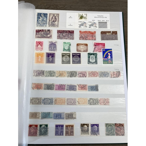 504 - Five stamp albums containing a collection of worldwide stamps