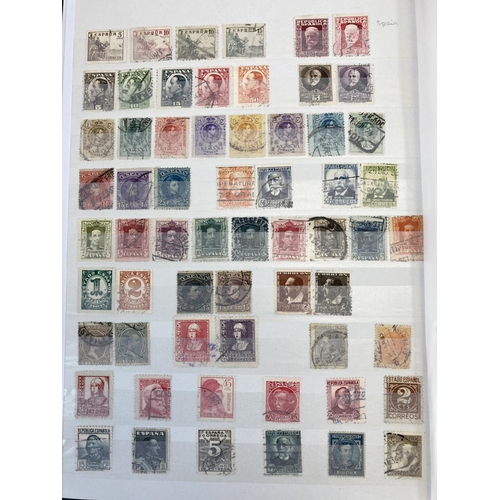 504 - Five stamp albums containing a collection of worldwide stamps