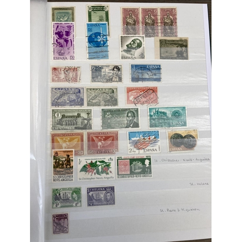 504 - Five stamp albums containing a collection of worldwide stamps