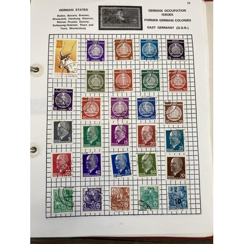 505 - Five stamp albums containing a collection of worldwide stamps