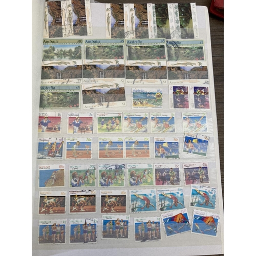 505 - Five stamp albums containing a collection of worldwide stamps