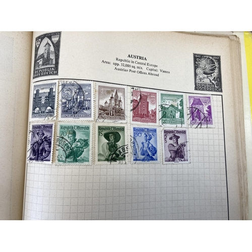 507 - Three stamp albums containing a collection of worldwide stamps