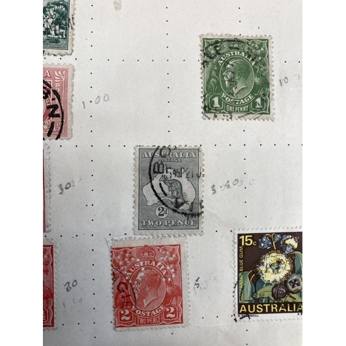 507 - Three stamp albums containing a collection of worldwide stamps