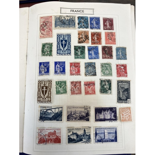 508 - Six stamp albums containing a collection of worldwide stamps